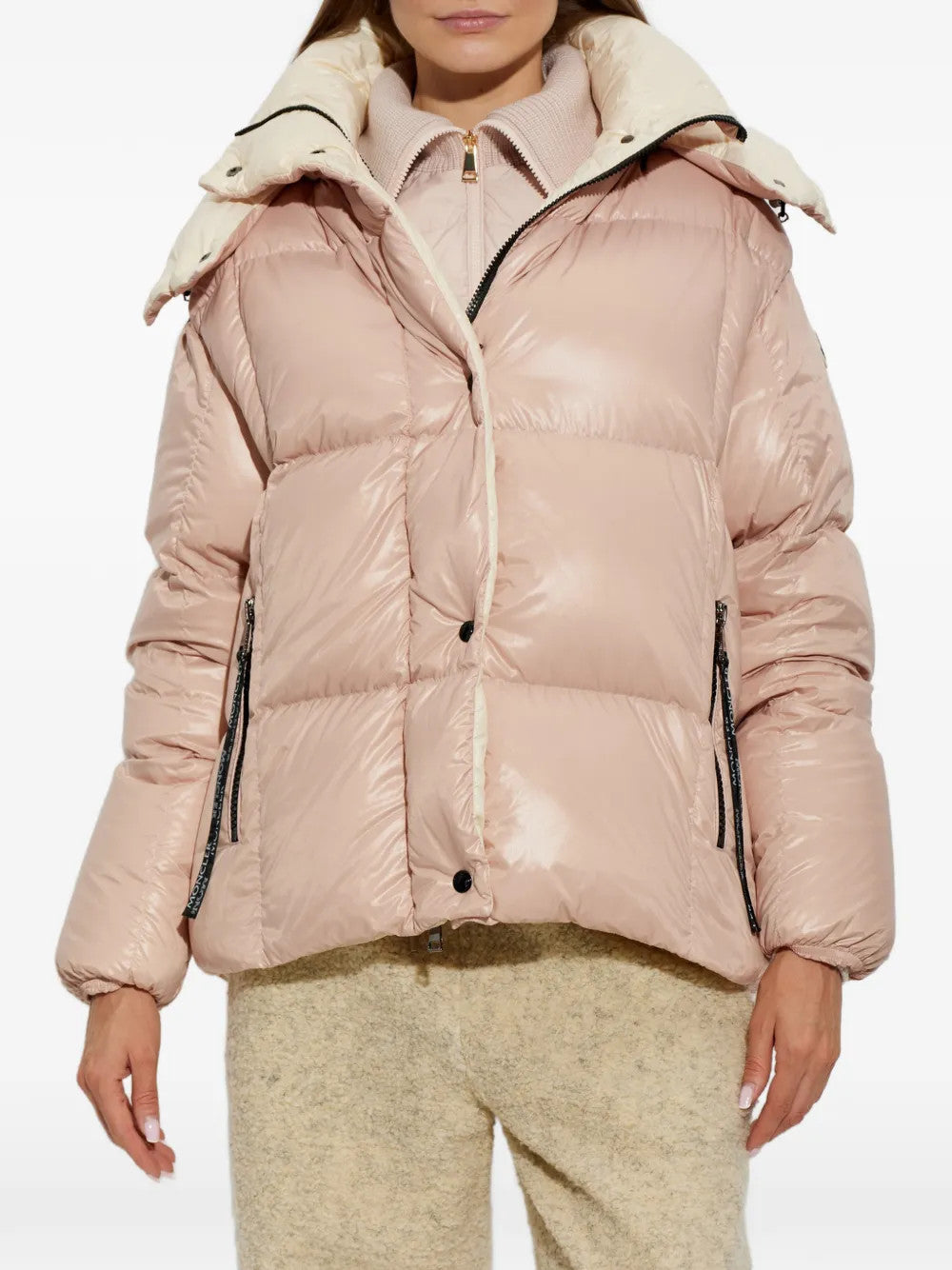 Pink jacket worn by a person, showing the jacket fit