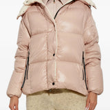 Pink jacket worn by a person, showing the jacket fit