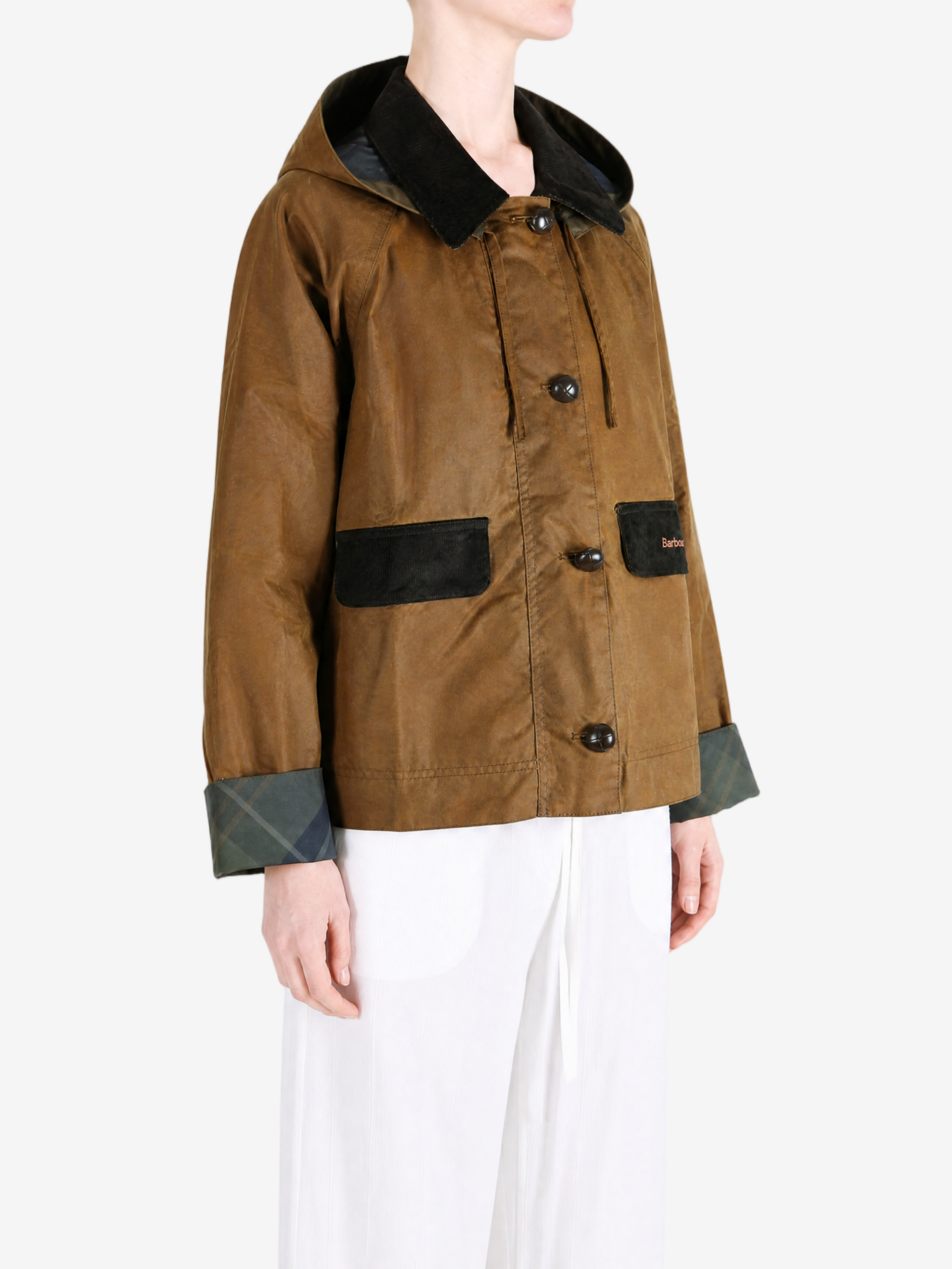 Brown jacket worn by a person, showing the jacket fit