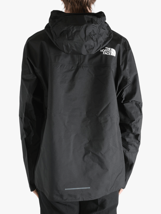 Black jacket worn by a person, showing the jacket's fit