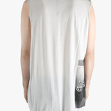 White top worn by a person, showing the top's fit