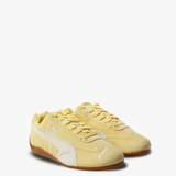 Yellow sneakers, front view