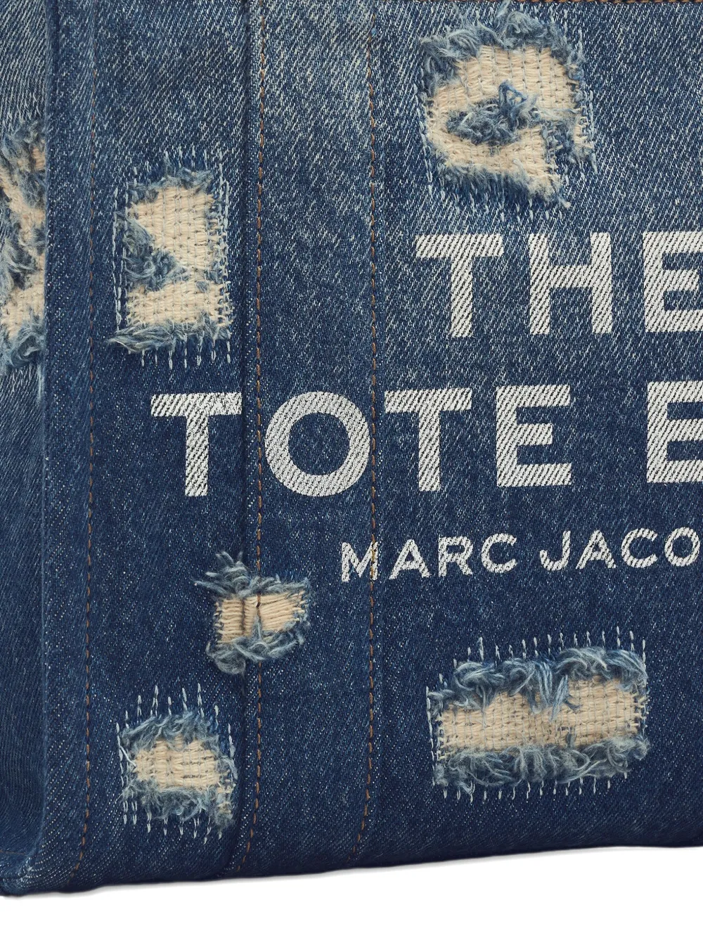 Close up of the blue bag, showing texture of the cotton fabric