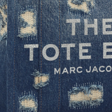 Close up of the blue bag, showing texture of the cotton fabric