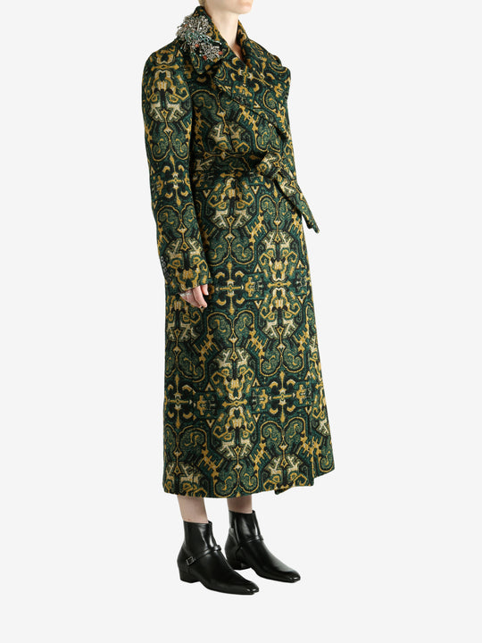 Green coat worn by a person, showing the coat's fit