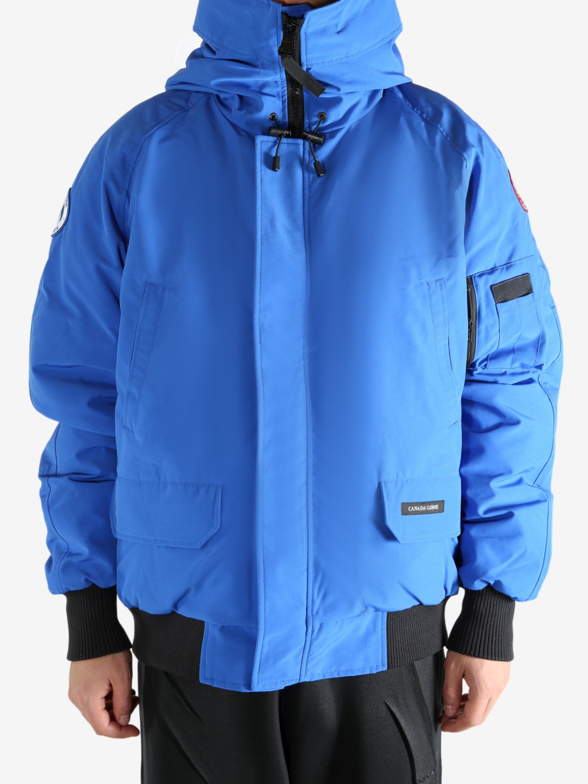 Blue jacket worn by a person, showing the jacket's fit