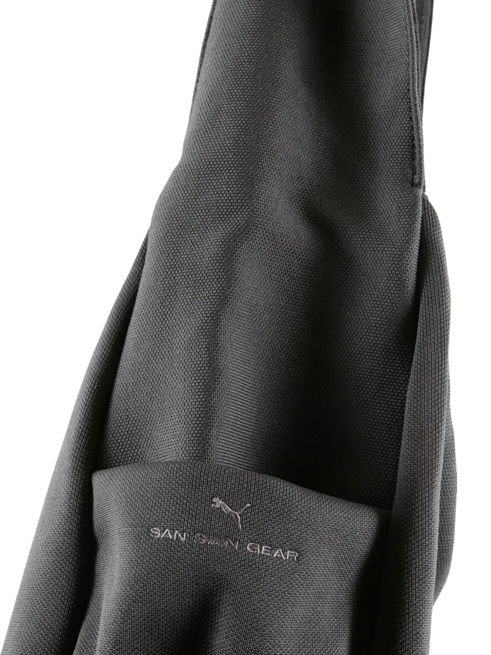 Close up of the grey bag, showing texture of the fabric