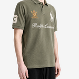 Green shirt worn by a person, showing the shirt fit