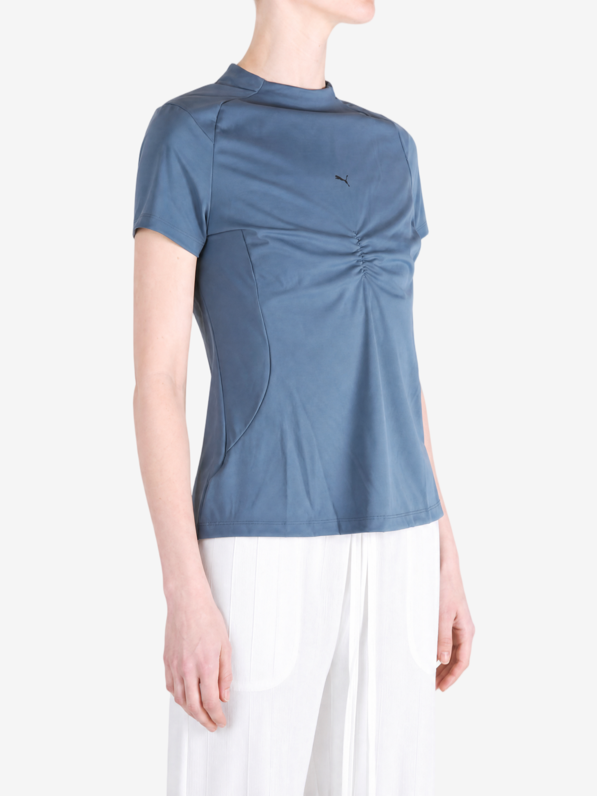 Blue top worn by a person, showing the top fit