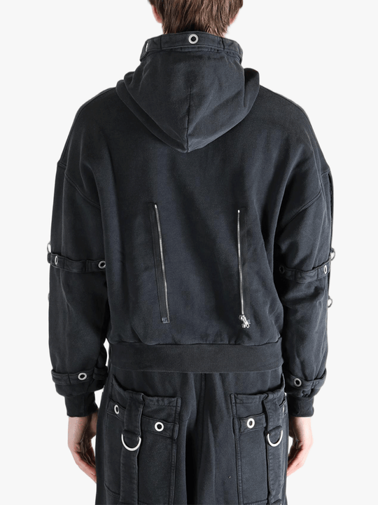 Black jacket worn by a person, showing the jacket's fit