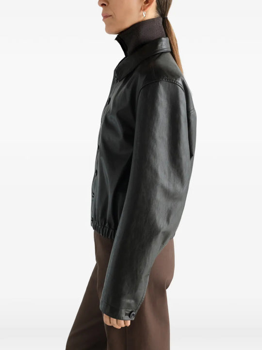 Black jacket worn by a person, showing the jacket fit