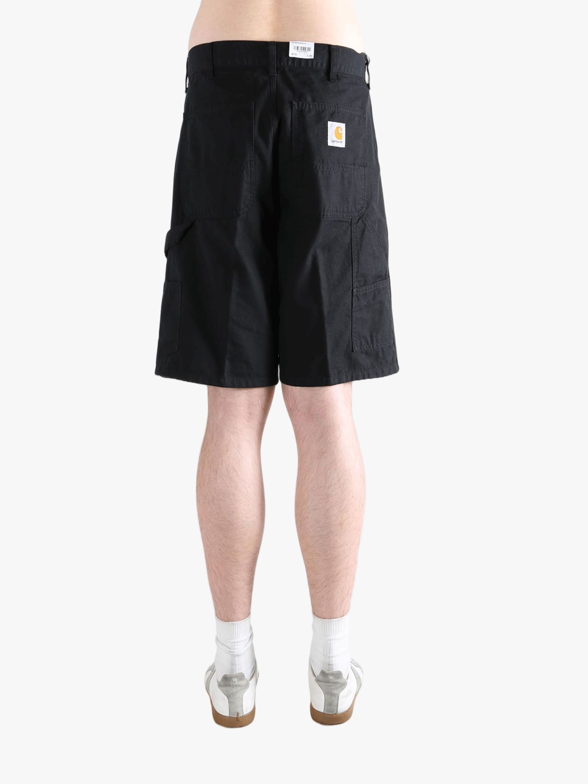 Black shorts worn by a person, showing the shorts fit