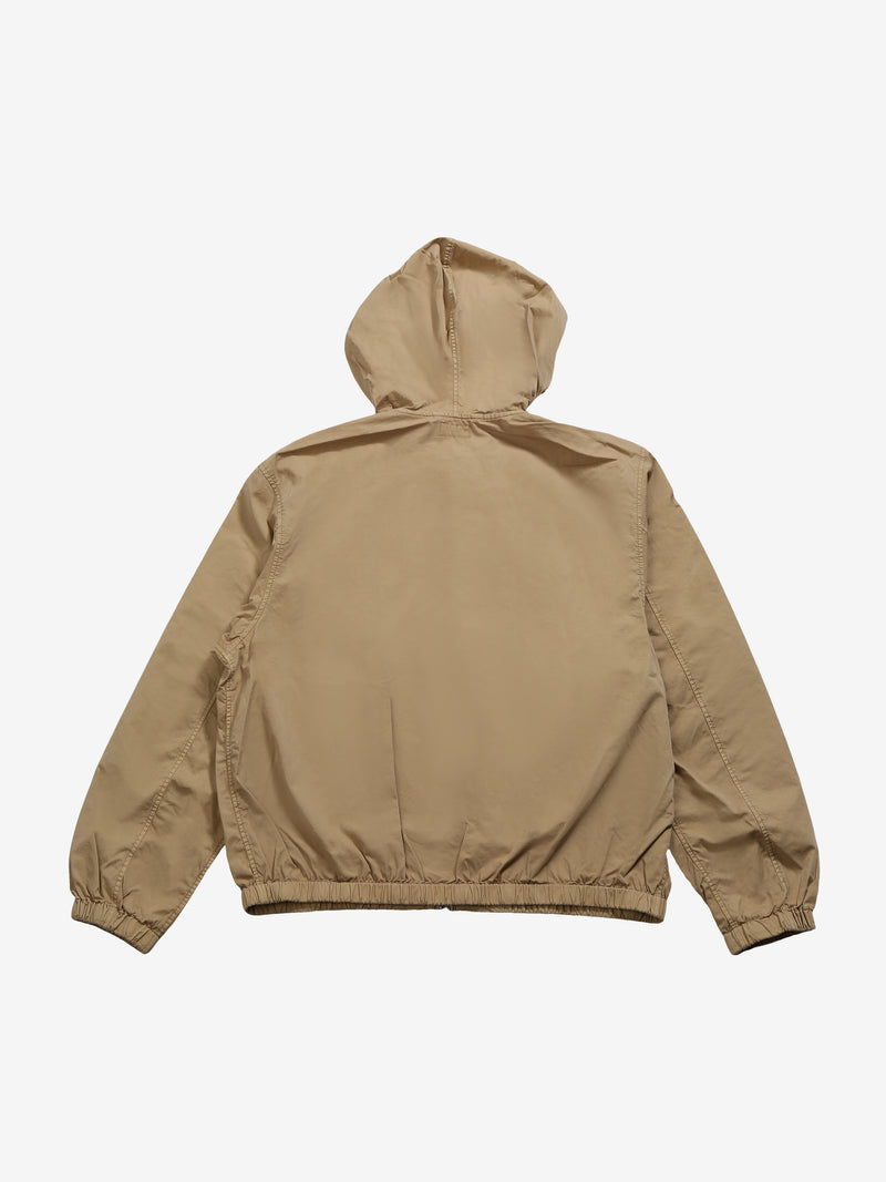 Tan jacket, back view showing loose fit