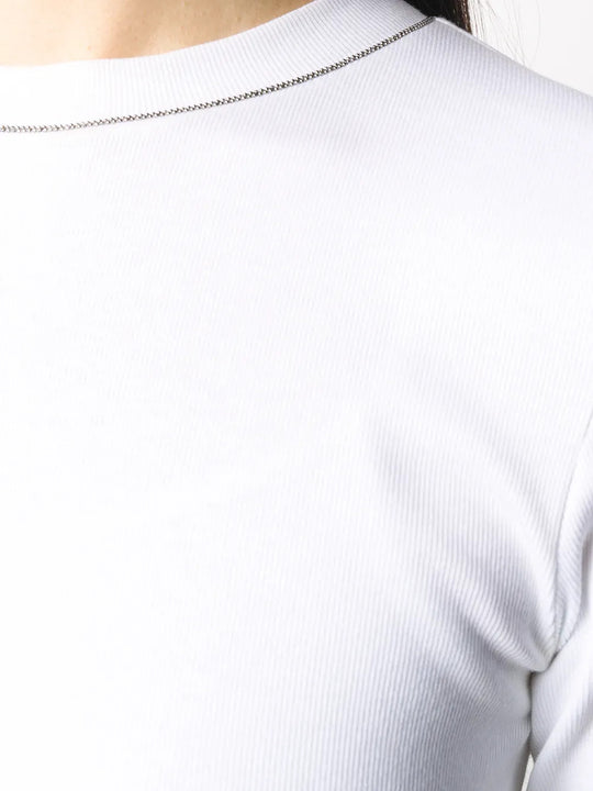 Close up of White t-shirt, showing texture of the 94% cotton/ 6% elastane fabric