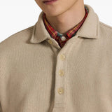 Tan top worn by a person, showing the top fit