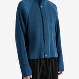 Blue jacket worn by a person, showing the jacket fit