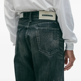 Blue pants worn by a person, showing the pants fit