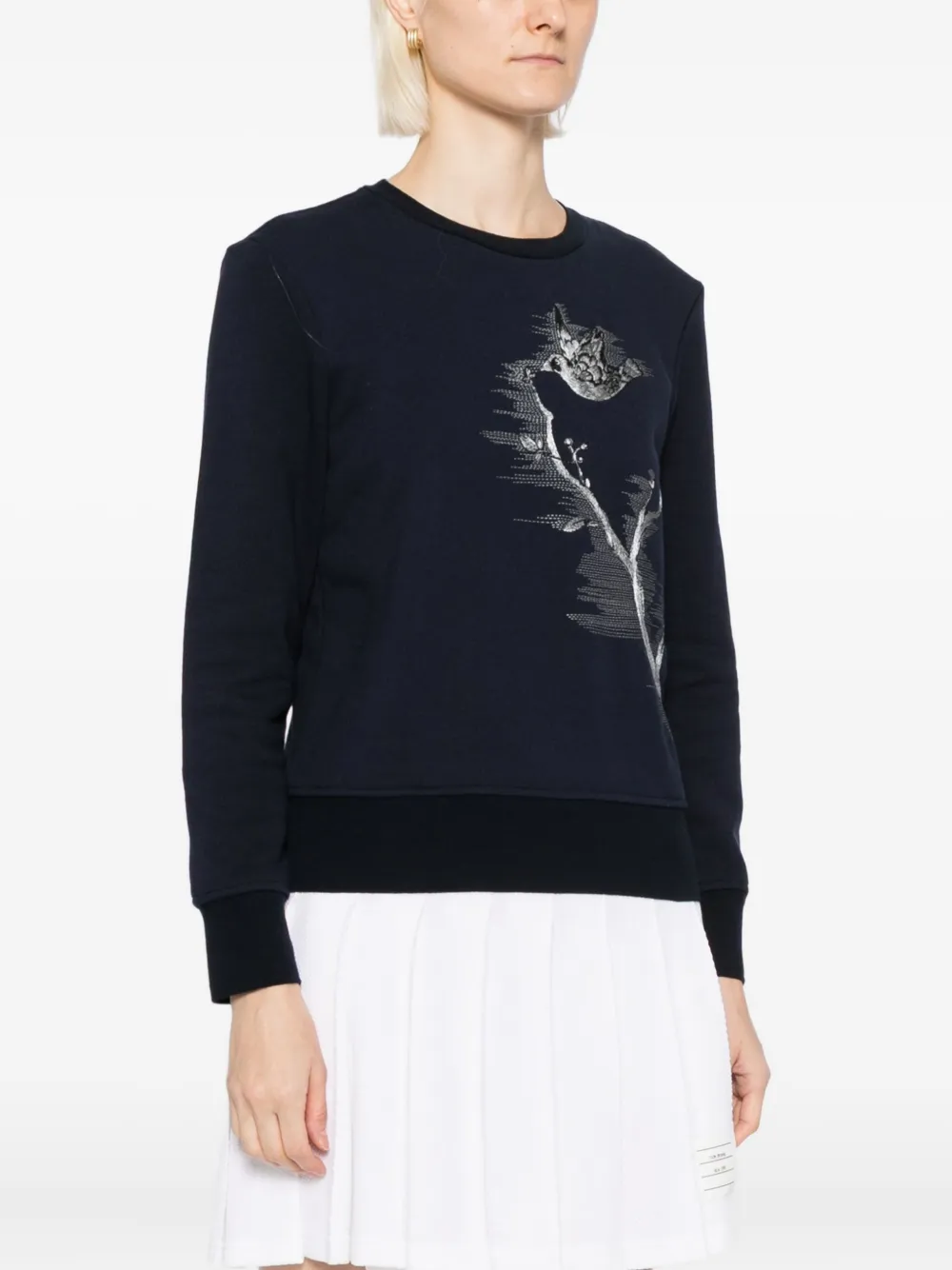 Navy sweata-hoodies worn by a person, showing the sweats-hoodies fit