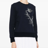 Navy sweata-hoodies worn by a person, showing the sweats-hoodies fit