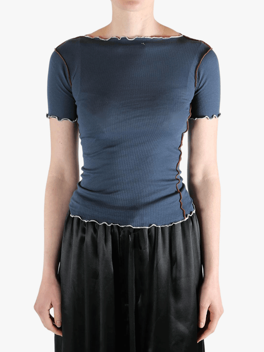 Blue t-shirt worn by a person, showing the shirt's fit