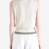 Tan top worn by a person, showing the top fit