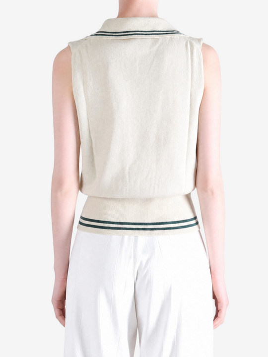 Tan top worn by a person, showing the top fit