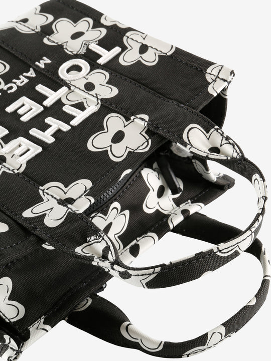 Close up of the black bag, showing texture of the cotton fabric