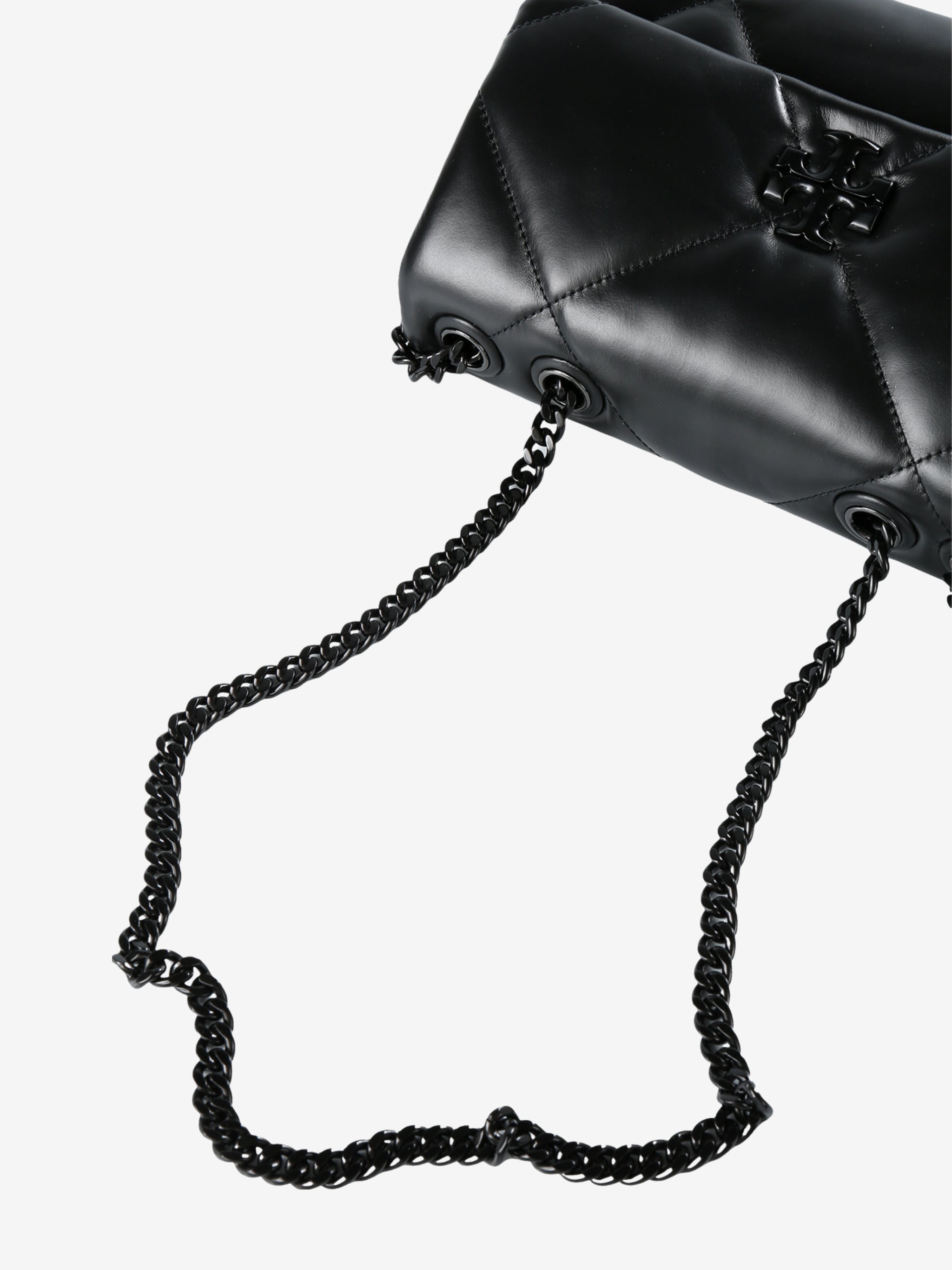 Close up of black bag, showing texture of the leather fabric