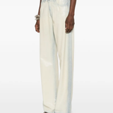 grey pants worn by a person, showing the pants' fit