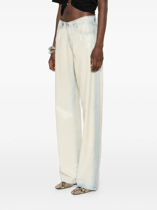 grey pants worn by a person, showing the pants' fit