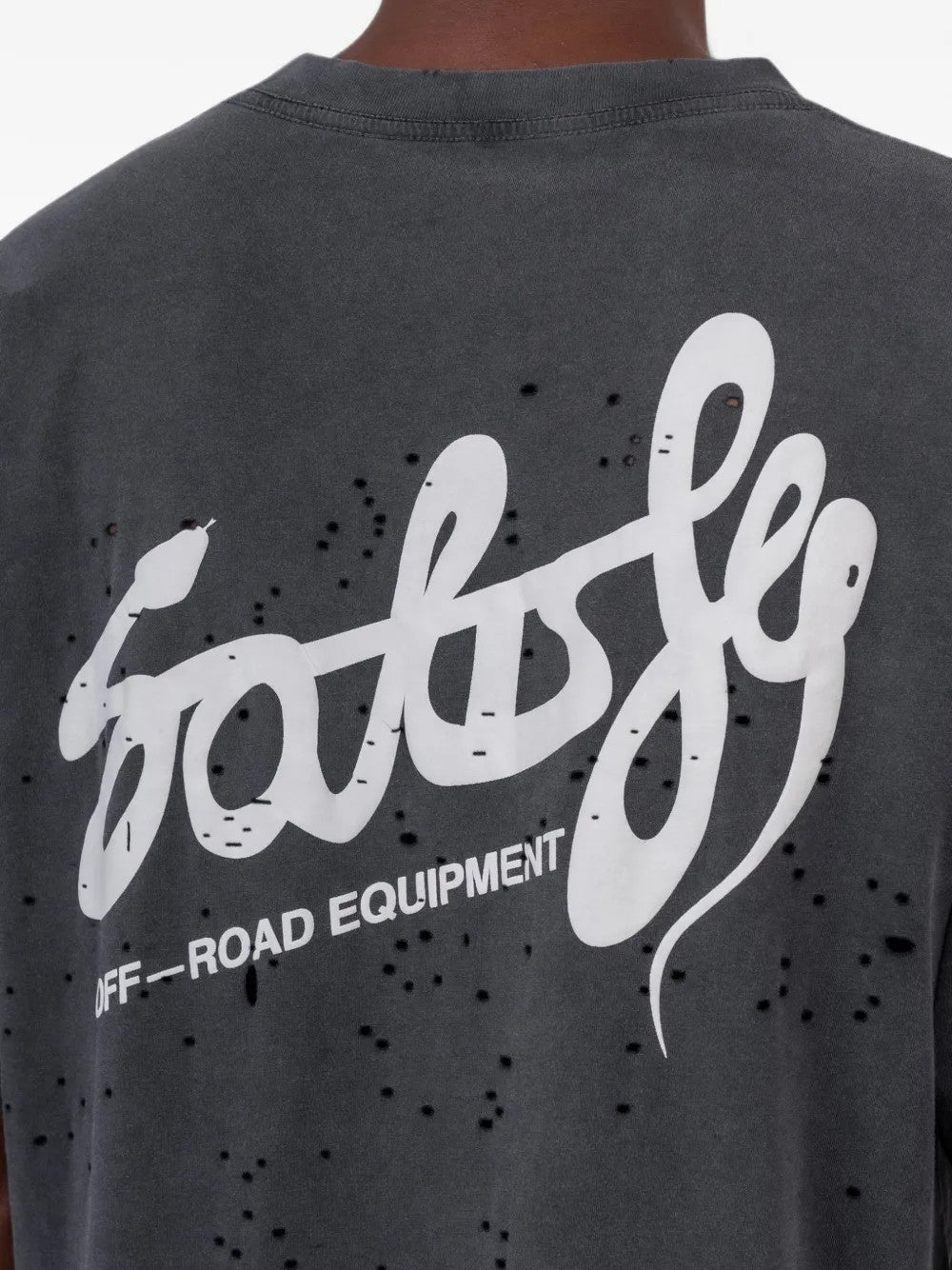 Black t-shirt worn by a person, showing the t-shirt fit