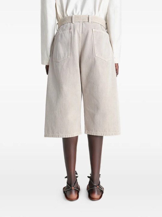 Beige wide-leg pant worn by a person, showing the pants fit