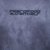 Close up of blue hoodie, showing texture of the fabric