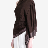 Brown top worn by a person, showing the top fit