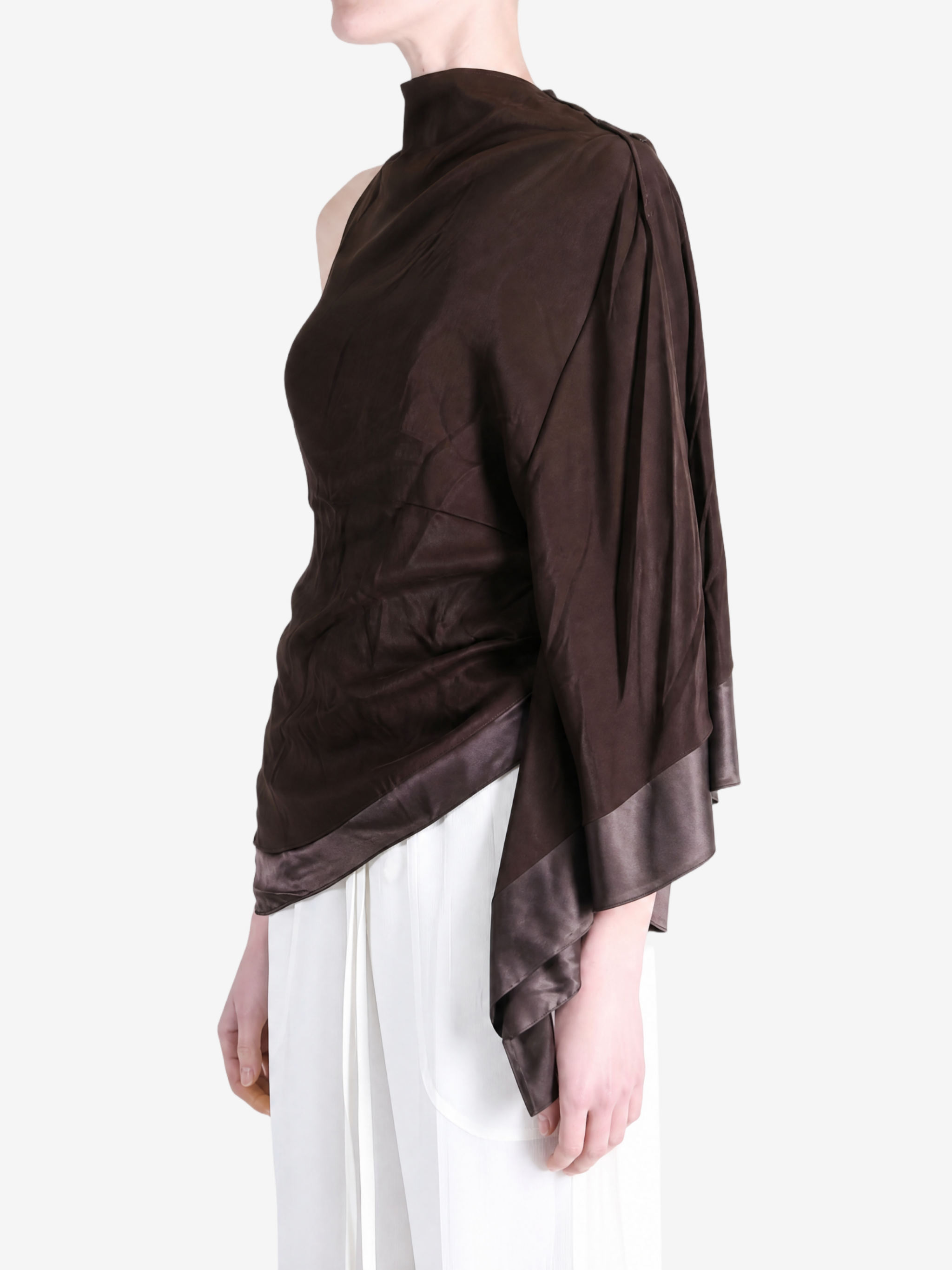 Brown top worn by a person, showing the top fit