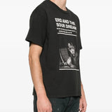 Black t-shirt worn by a person, showing the t-shirt's fit