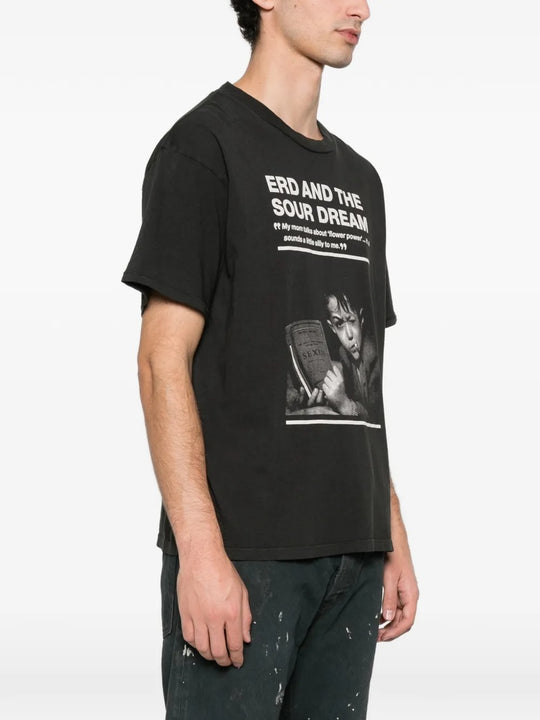 Black t-shirt worn by a person, showing the t-shirt's fit