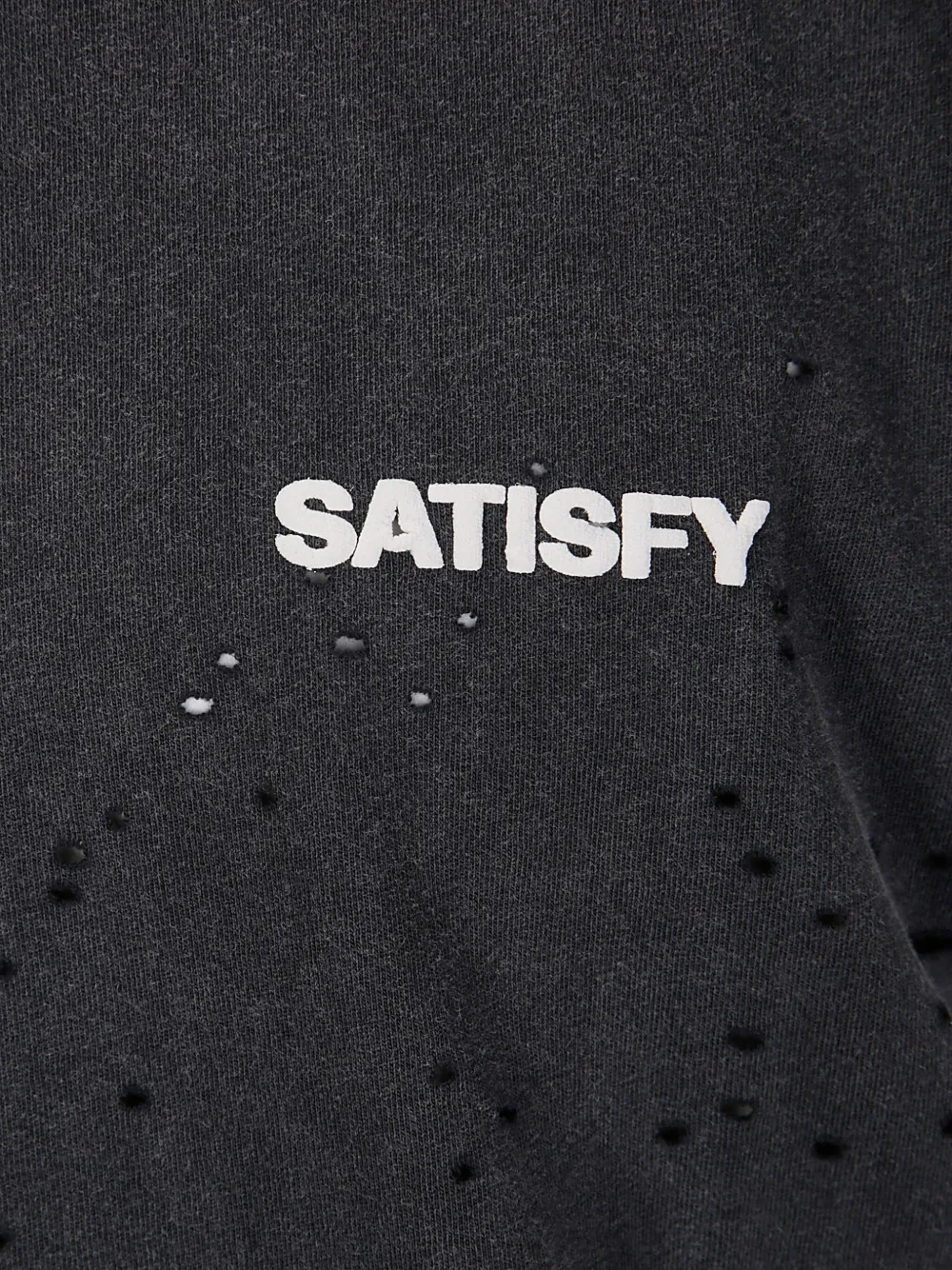 Close up of black top, showing texture of the cotton fabric