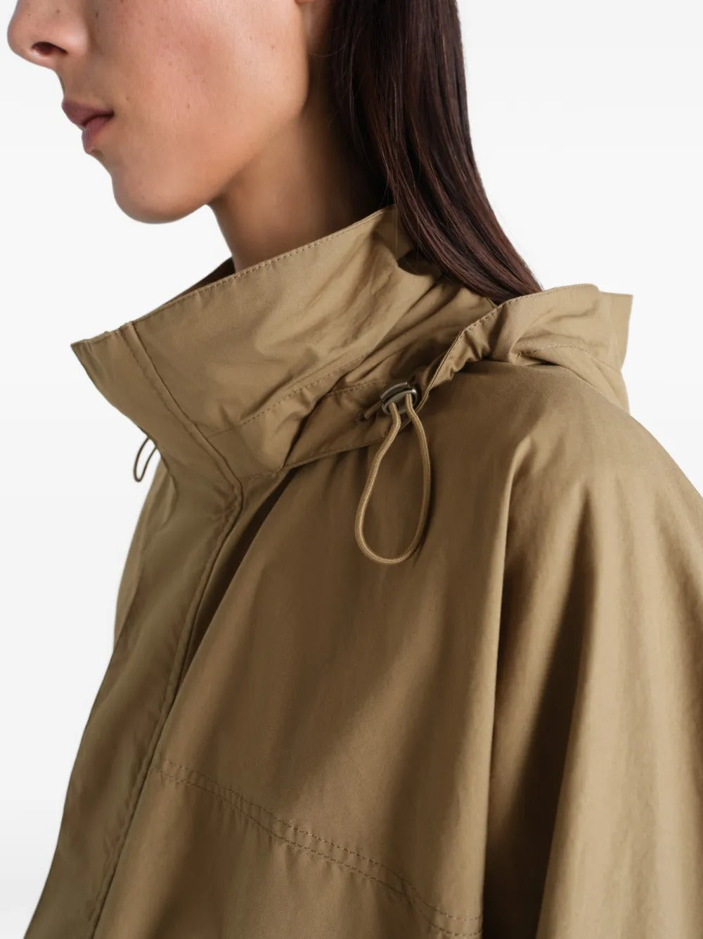 Close up of bronwn jacket, showing texture of the cotton fabric