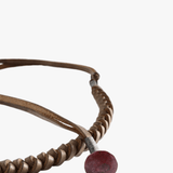Close up of Brown jewelry, showing detail