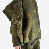 Grey jacket worn by a person, showing the jacket's fit