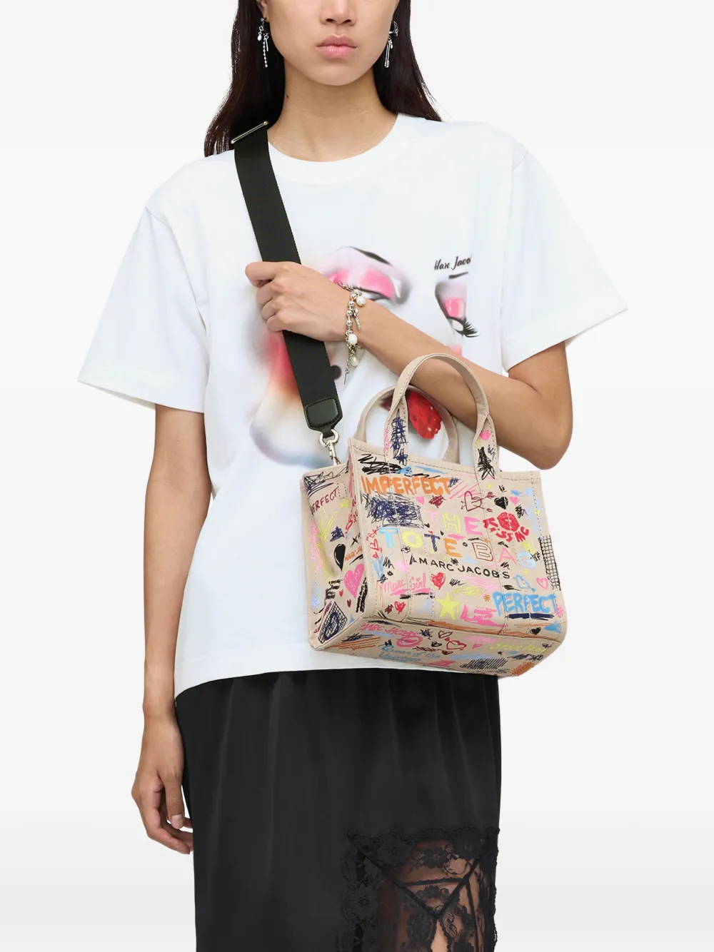 Pink bag worn by a person, showing the bag fit