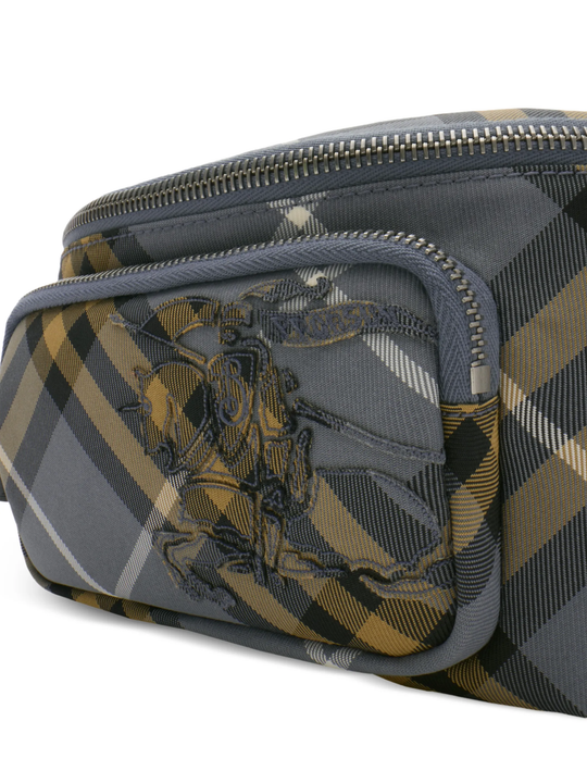 Close up of navy bag, showing texture of the polyester fabric