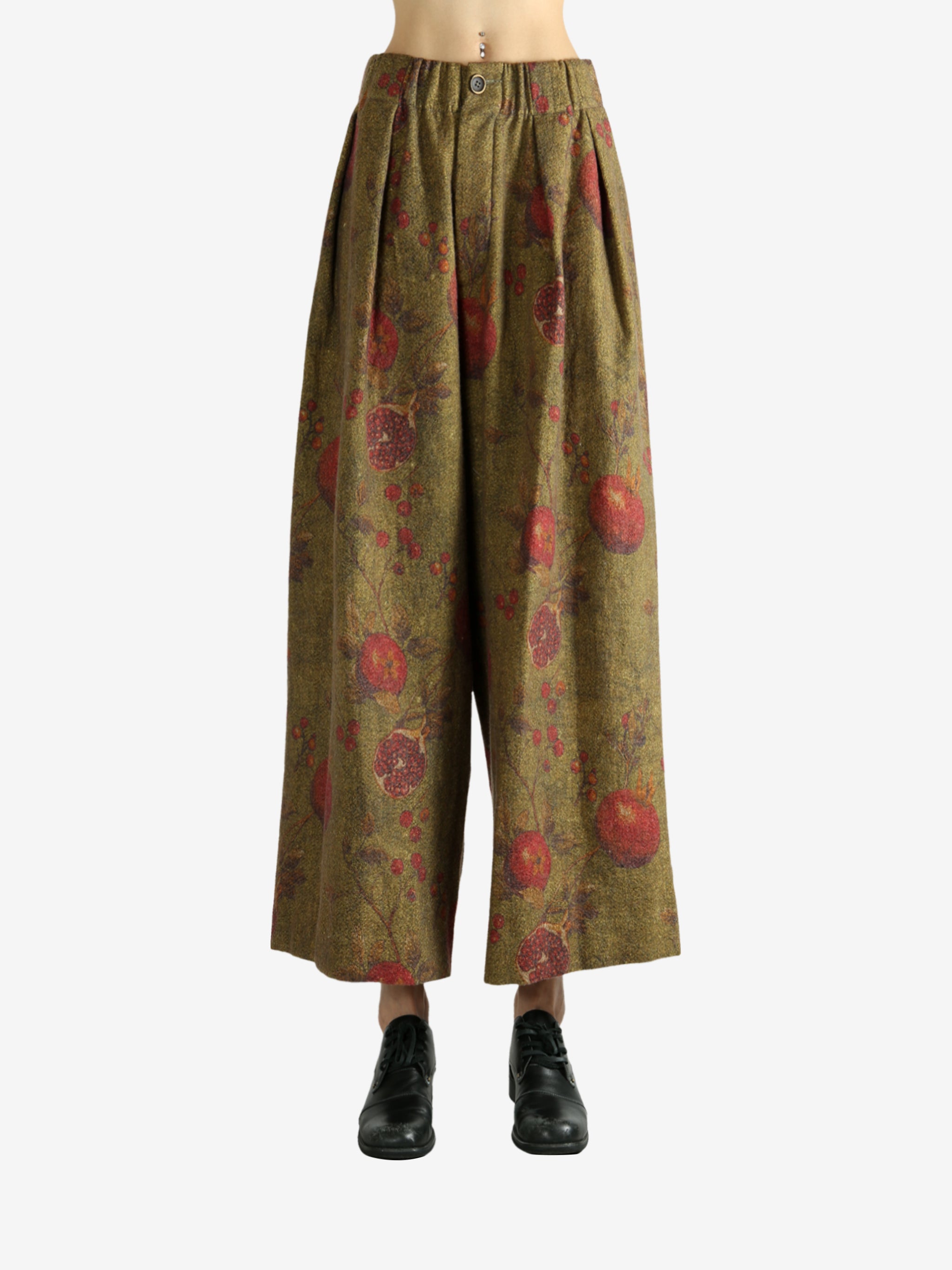 Tan pants worn by a person, showing the pants' fit