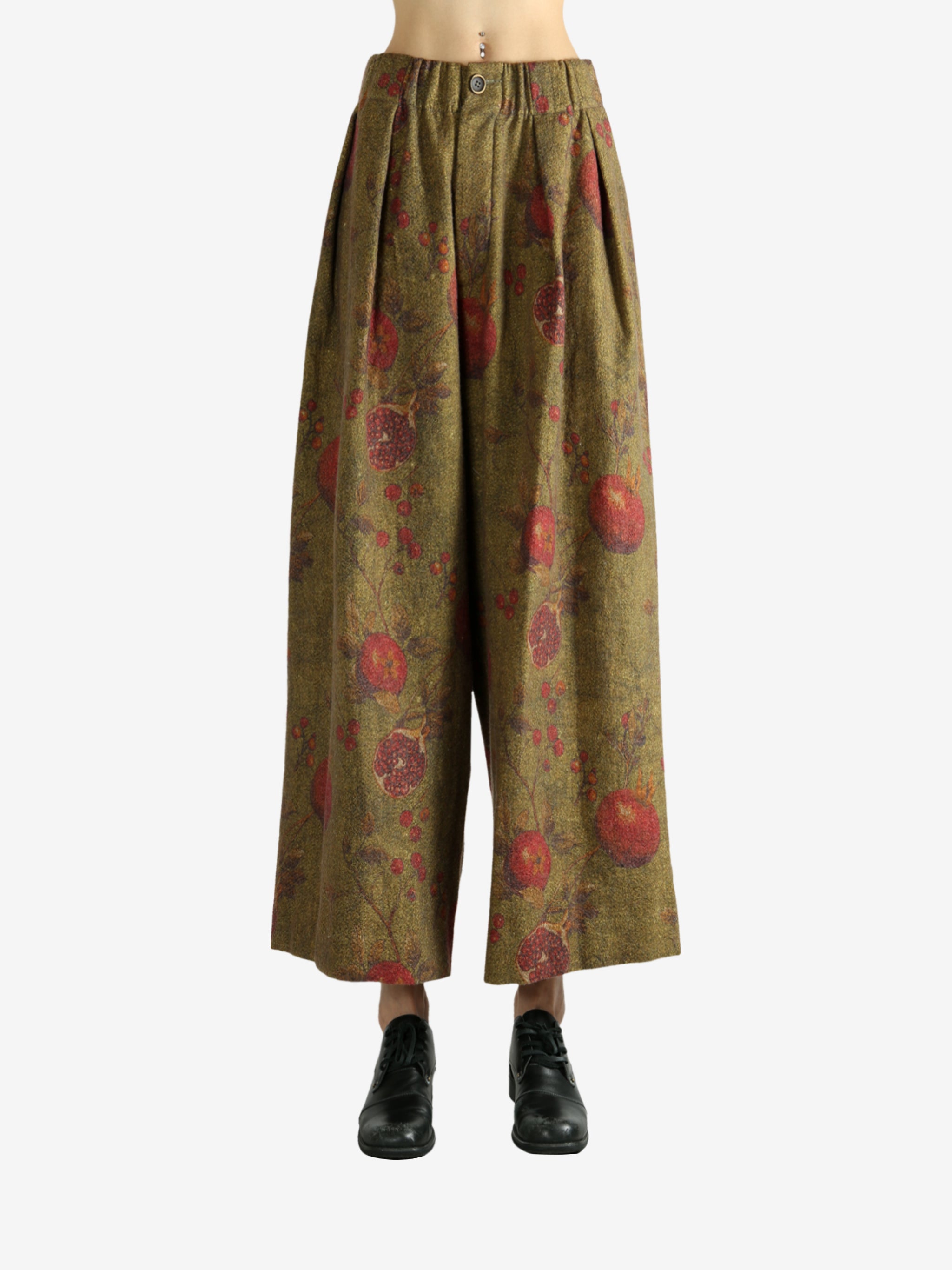 Tan pants worn by a person, showing the pants' fit