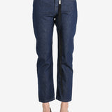 Dark blue pants worn by a person, showing the pants's fit