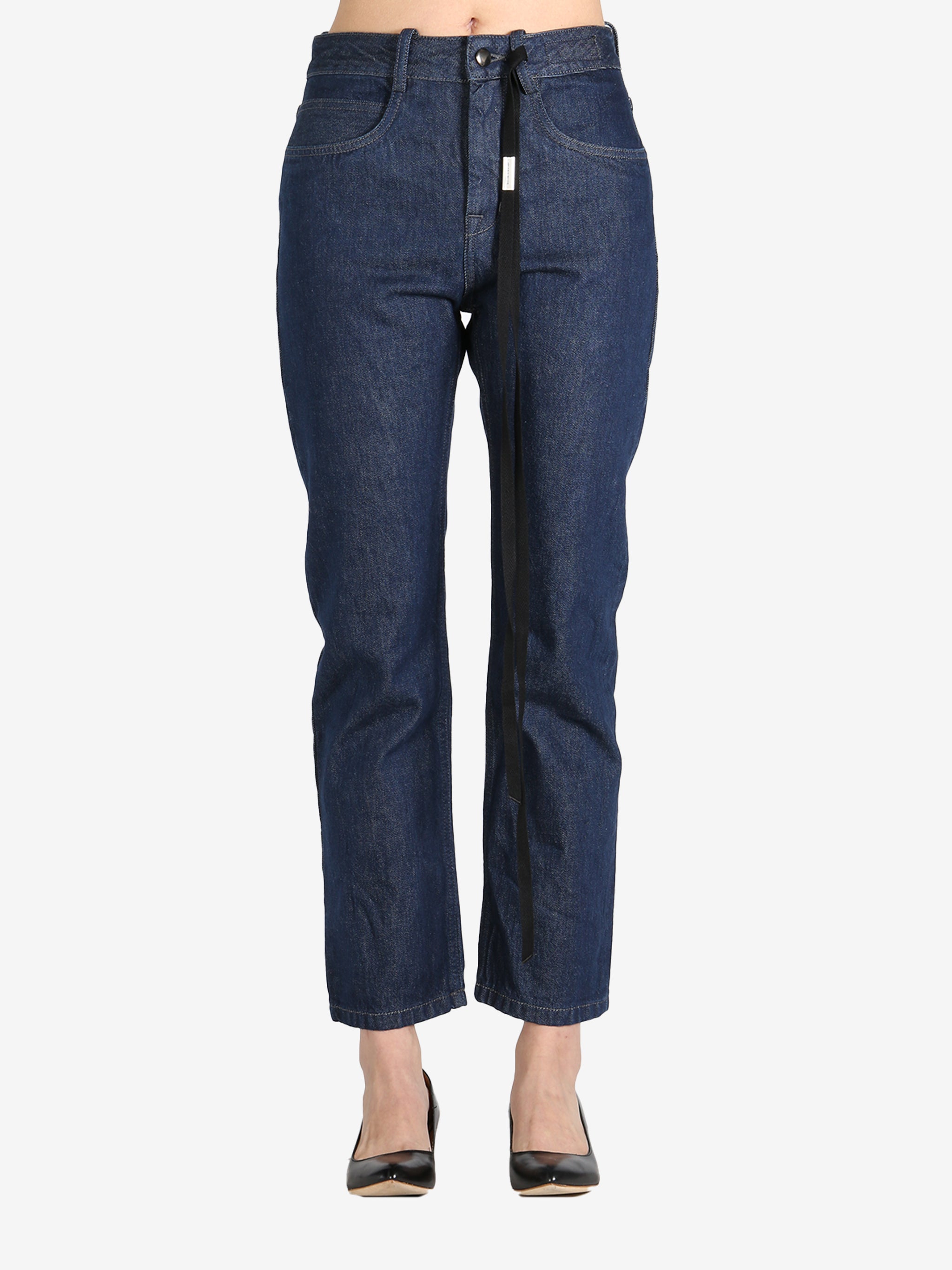 Dark blue pants worn by a person, showing the pants's fit