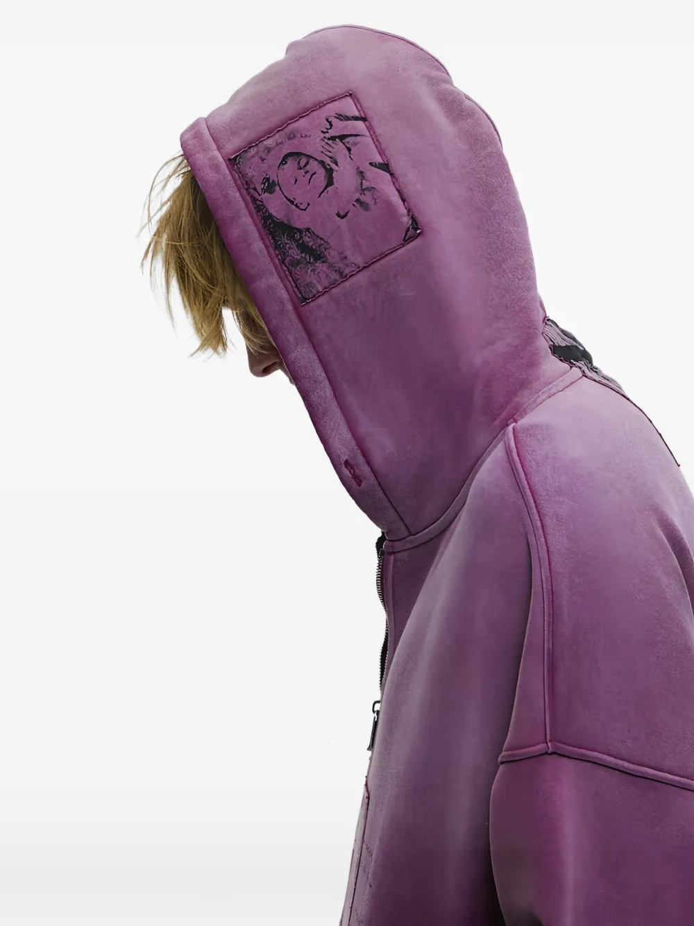 Purple hoodie worn by a person, showing the hoodie fit