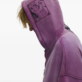 Purple hoodie worn by a person, showing the hoodie fit