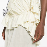 Tan skirt worn by a person, showing the skirt fit
